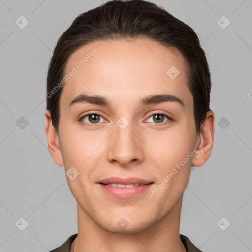 Joyful white young-adult male with short  brown hair and brown eyes