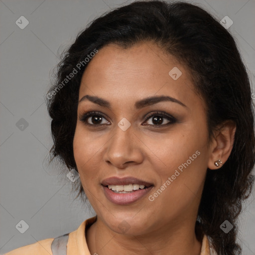 Joyful latino young-adult female with medium  brown hair and brown eyes