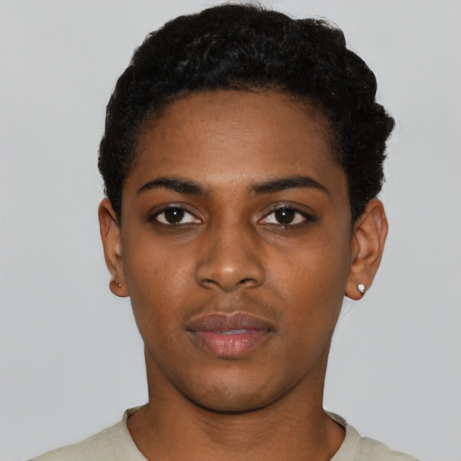 Neutral black young-adult female with short  black hair and brown eyes