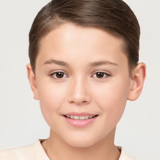 Joyful white child female with short  brown hair and brown eyes