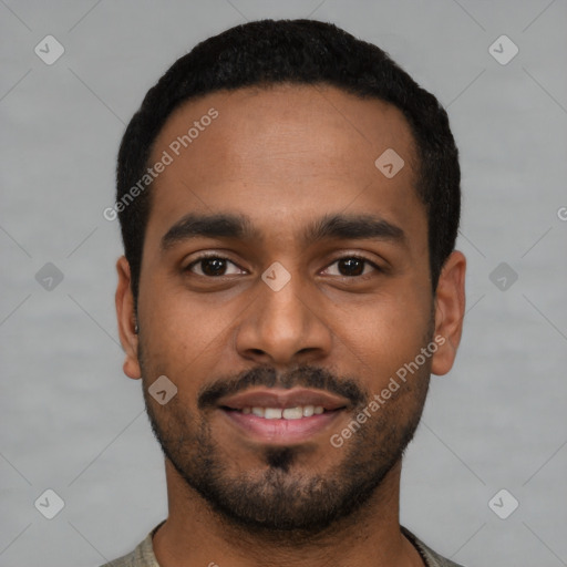 Joyful latino young-adult male with short  black hair and brown eyes