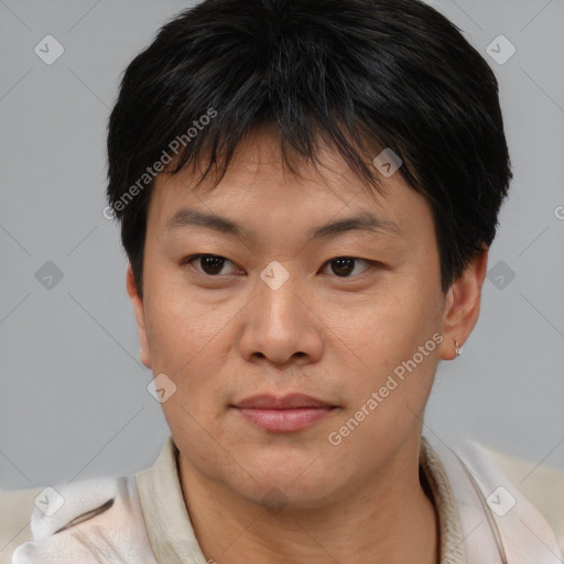 Joyful asian young-adult female with short  brown hair and brown eyes