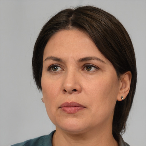Neutral white adult female with medium  brown hair and brown eyes