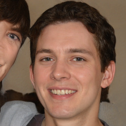 Joyful white young-adult male with medium  brown hair and brown eyes