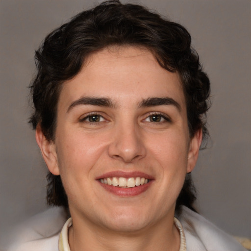 Joyful white young-adult male with medium  brown hair and brown eyes