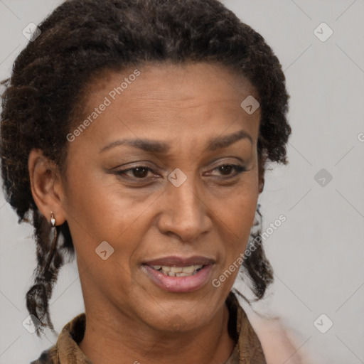 Joyful black adult female with short  brown hair and brown eyes