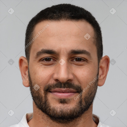 Joyful white young-adult male with short  black hair and brown eyes