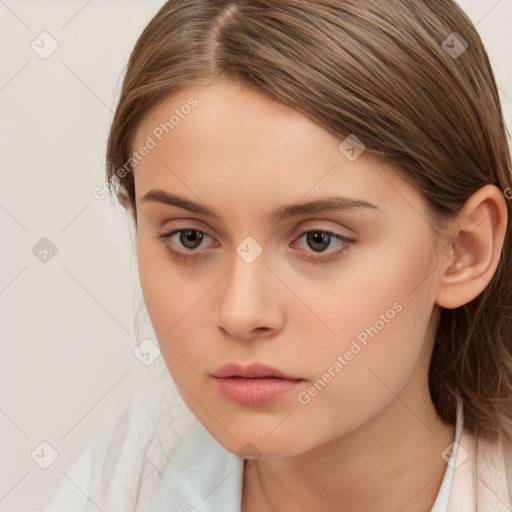 Neutral white young-adult female with long  brown hair and brown eyes