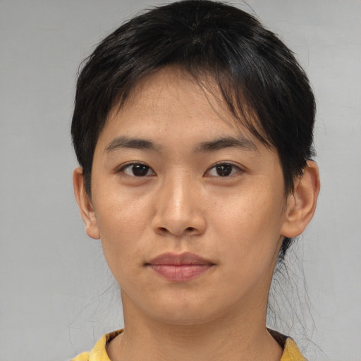 Neutral asian young-adult male with short  brown hair and brown eyes