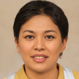 Joyful asian young-adult female with short  brown hair and brown eyes