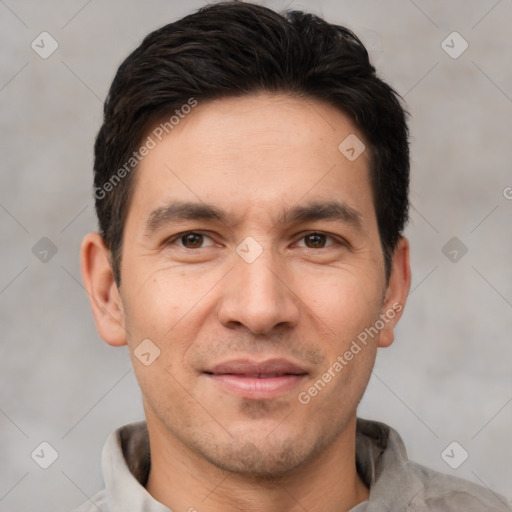 Joyful white young-adult male with short  black hair and brown eyes