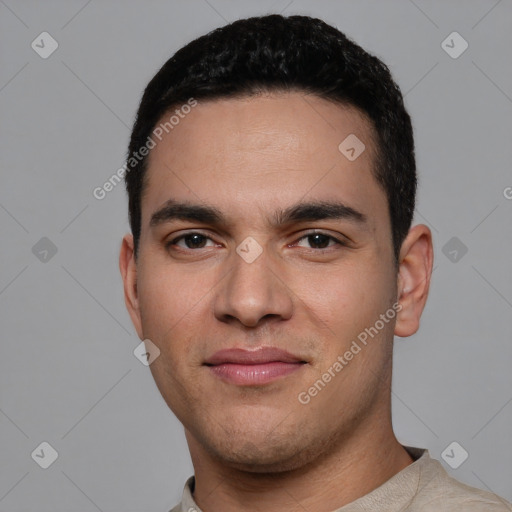 Joyful white young-adult male with short  black hair and brown eyes