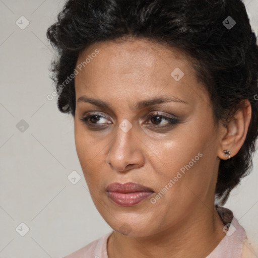 Joyful black adult female with short  brown hair and brown eyes