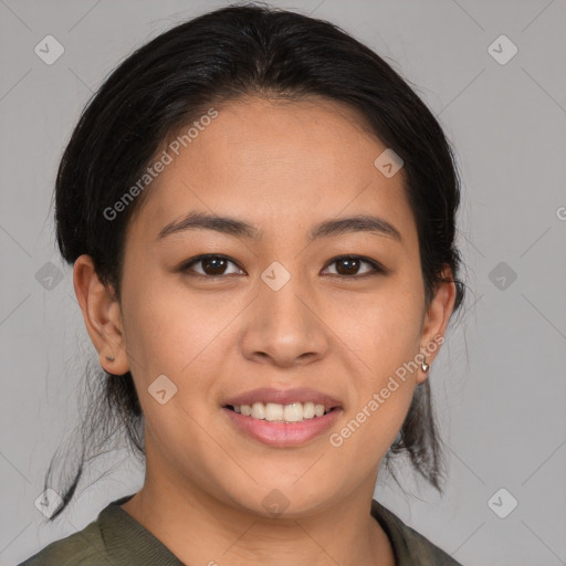 Joyful asian young-adult female with medium  brown hair and brown eyes