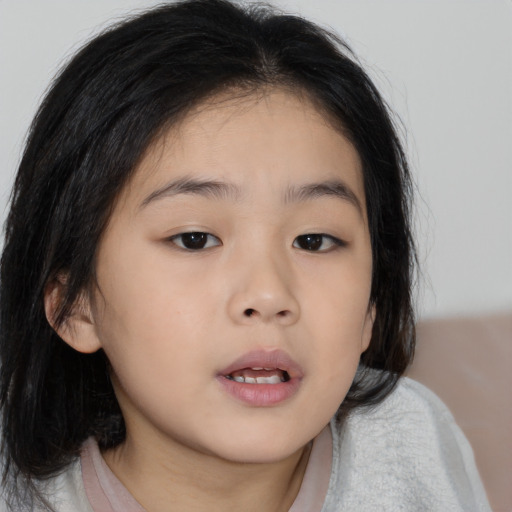 Neutral asian child female with medium  brown hair and brown eyes