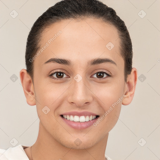 Joyful white young-adult female with short  brown hair and brown eyes