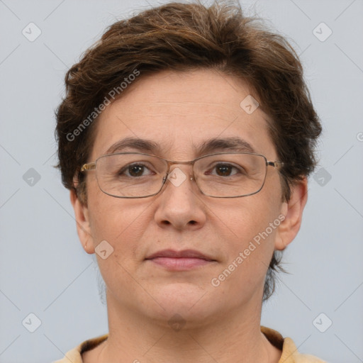 Joyful white adult female with short  brown hair and brown eyes