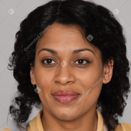 Joyful latino adult female with medium  brown hair and brown eyes