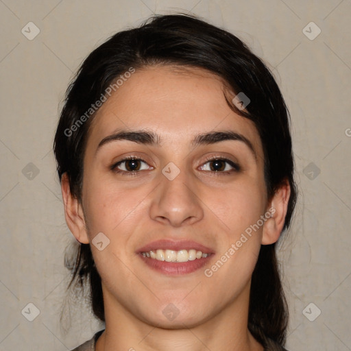 Joyful white young-adult female with medium  brown hair and brown eyes