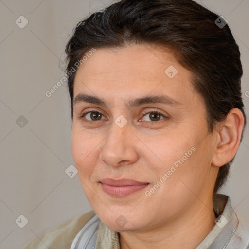 Joyful white adult female with short  brown hair and brown eyes