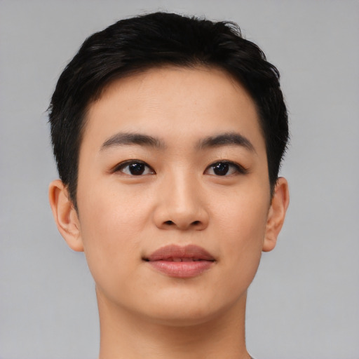 Joyful asian young-adult female with short  black hair and brown eyes