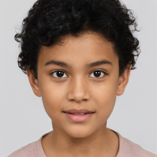 Joyful latino child female with short  brown hair and brown eyes