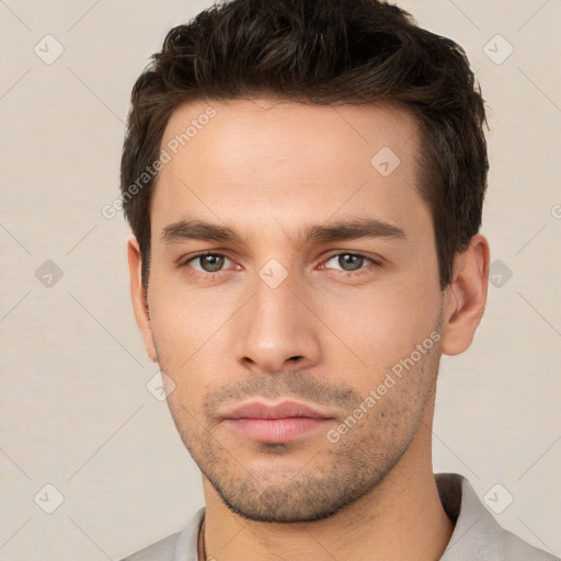 Neutral white young-adult male with short  brown hair and brown eyes