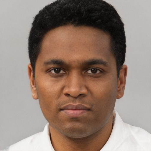 Neutral black young-adult male with short  black hair and brown eyes