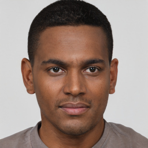 Neutral black young-adult male with short  black hair and brown eyes