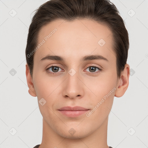 Joyful white young-adult female with short  brown hair and brown eyes