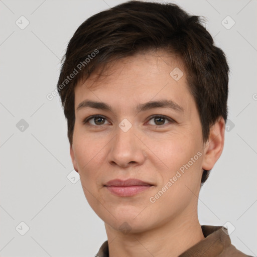 Joyful white young-adult female with short  brown hair and brown eyes