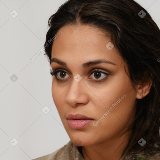 Neutral white young-adult female with long  brown hair and brown eyes