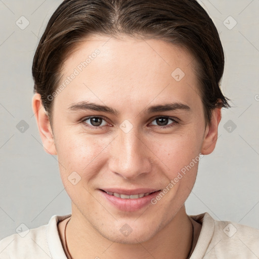 Joyful white young-adult female with short  brown hair and brown eyes