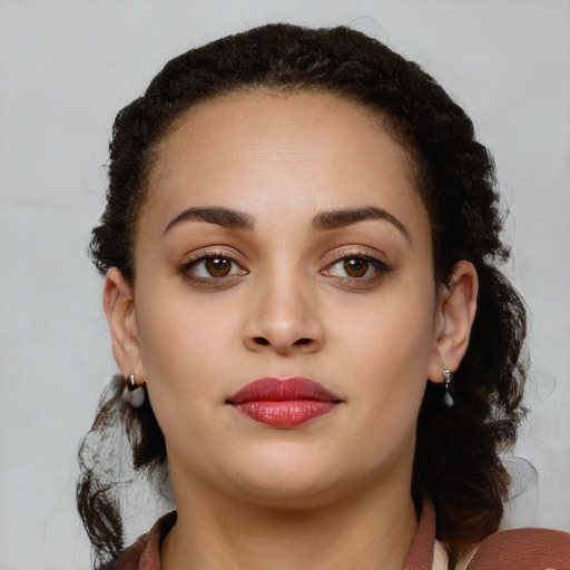 Neutral latino young-adult female with long  brown hair and brown eyes
