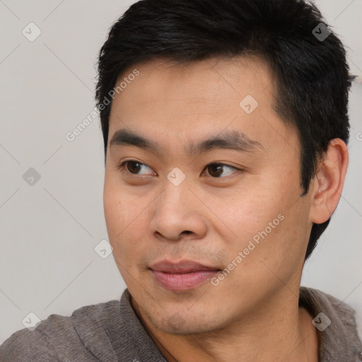 Neutral asian young-adult male with short  black hair and brown eyes