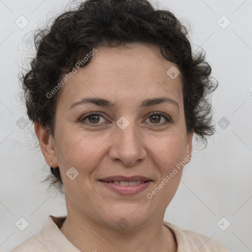 Joyful white adult female with short  brown hair and brown eyes