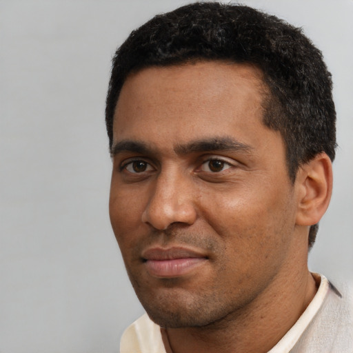 Neutral black young-adult male with short  black hair and brown eyes