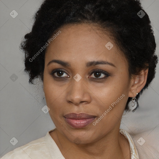 Joyful black adult female with short  brown hair and brown eyes