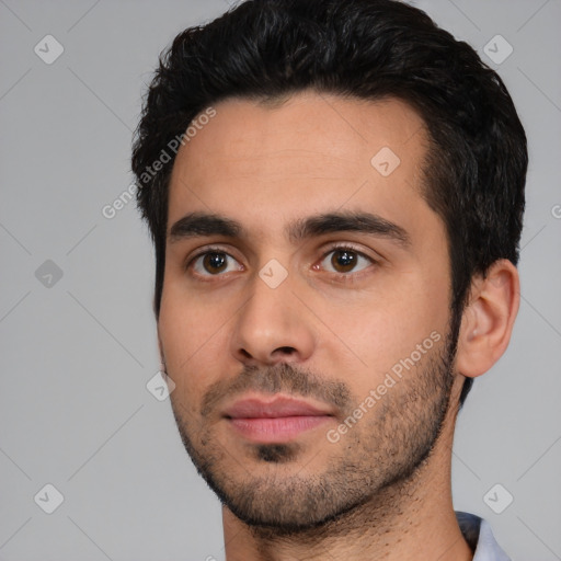 Neutral white young-adult male with short  black hair and brown eyes