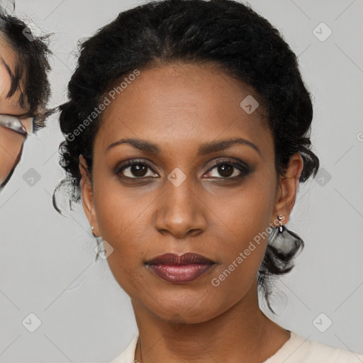 Joyful black young-adult female with medium  black hair and brown eyes