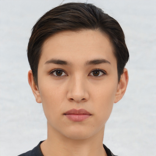 Neutral white young-adult female with short  brown hair and brown eyes