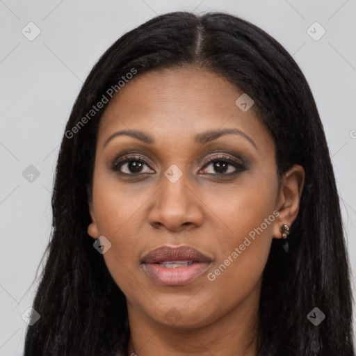 Joyful latino young-adult female with long  brown hair and brown eyes