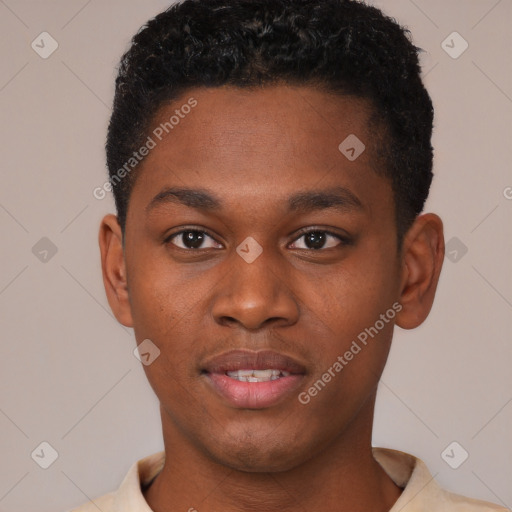 Joyful black young-adult male with short  brown hair and brown eyes