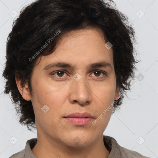 Joyful white adult male with medium  brown hair and brown eyes