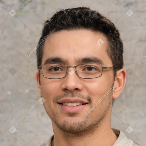 Joyful white young-adult male with short  black hair and brown eyes