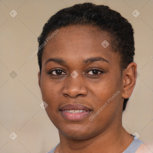 Joyful black young-adult female with short  black hair and brown eyes