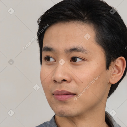 Neutral asian young-adult male with short  black hair and brown eyes