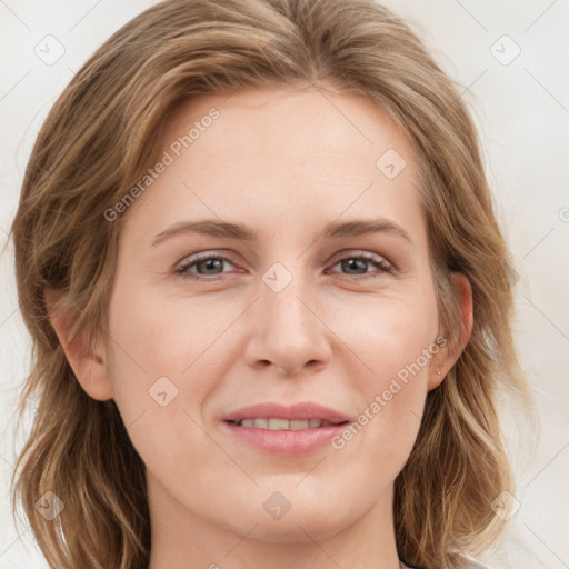 Joyful white young-adult female with medium  brown hair and blue eyes