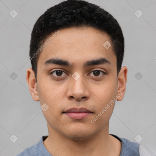 Neutral latino young-adult male with short  black hair and brown eyes