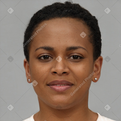 Joyful black young-adult female with short  brown hair and brown eyes